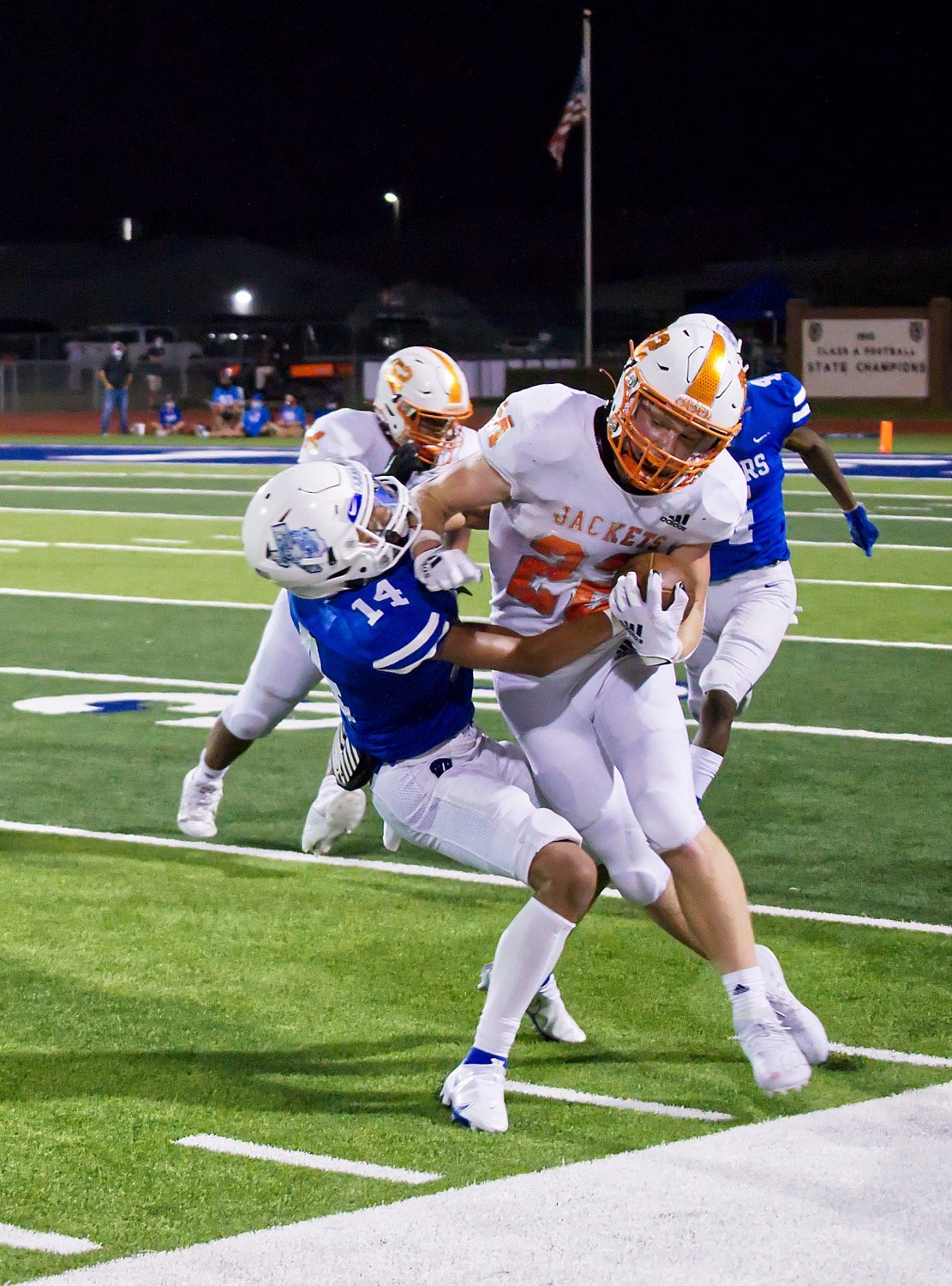 Dawson Pendergrass (22) of Mineola bulls ahead for extra yards in Friday’s 41-10 victory over the Wills Point Tigers. (Monitor photo by Sam Major)